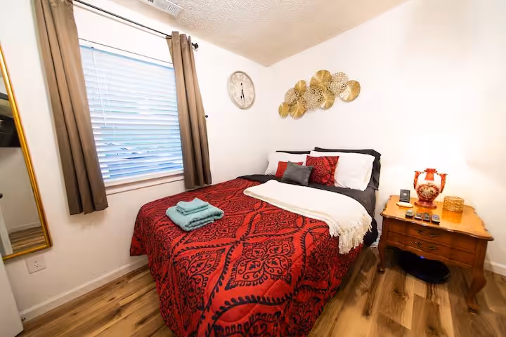 Buck Cottage bedroom alternate angle with window and nightstand