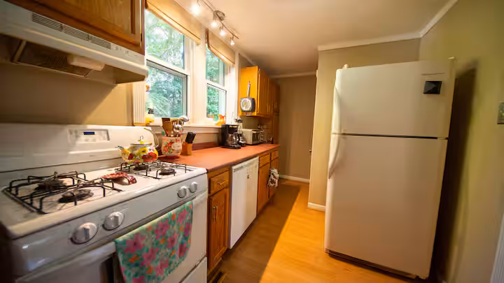 Frederick Cottage gas range with counter run and full-size refrigerator