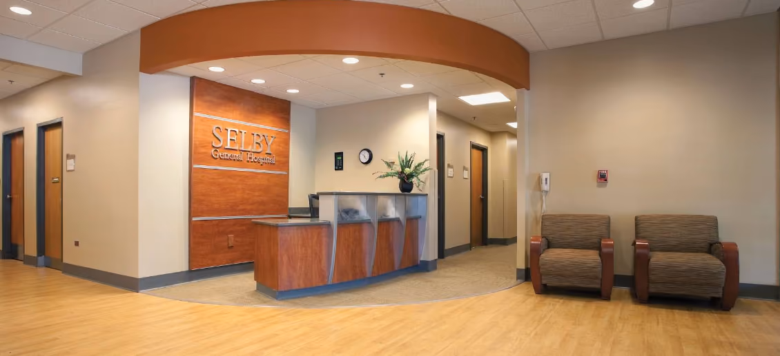 Selby General Hospital reception lobby with front desk and seating