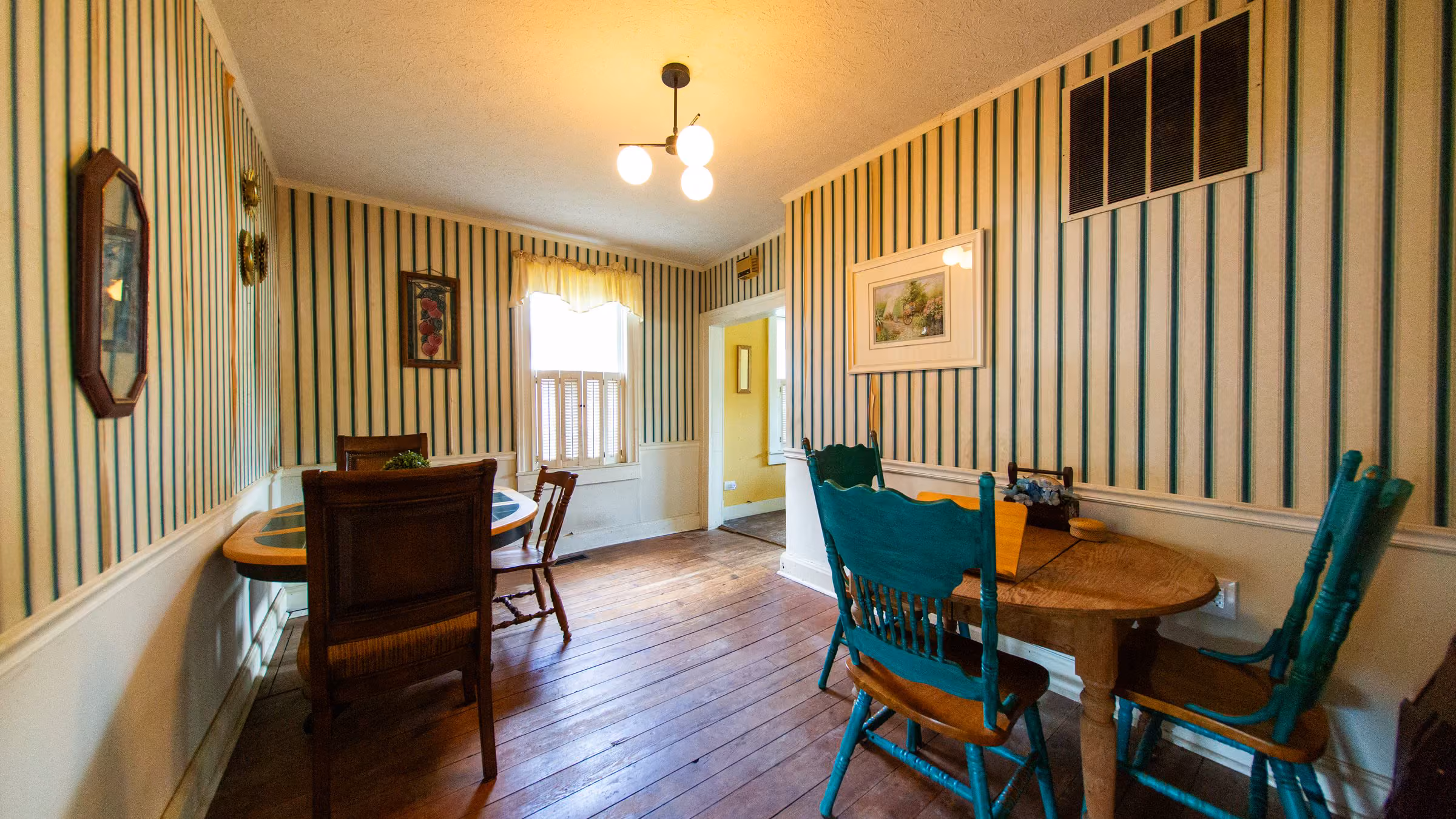 A furnished living and dining space for a transitional stay