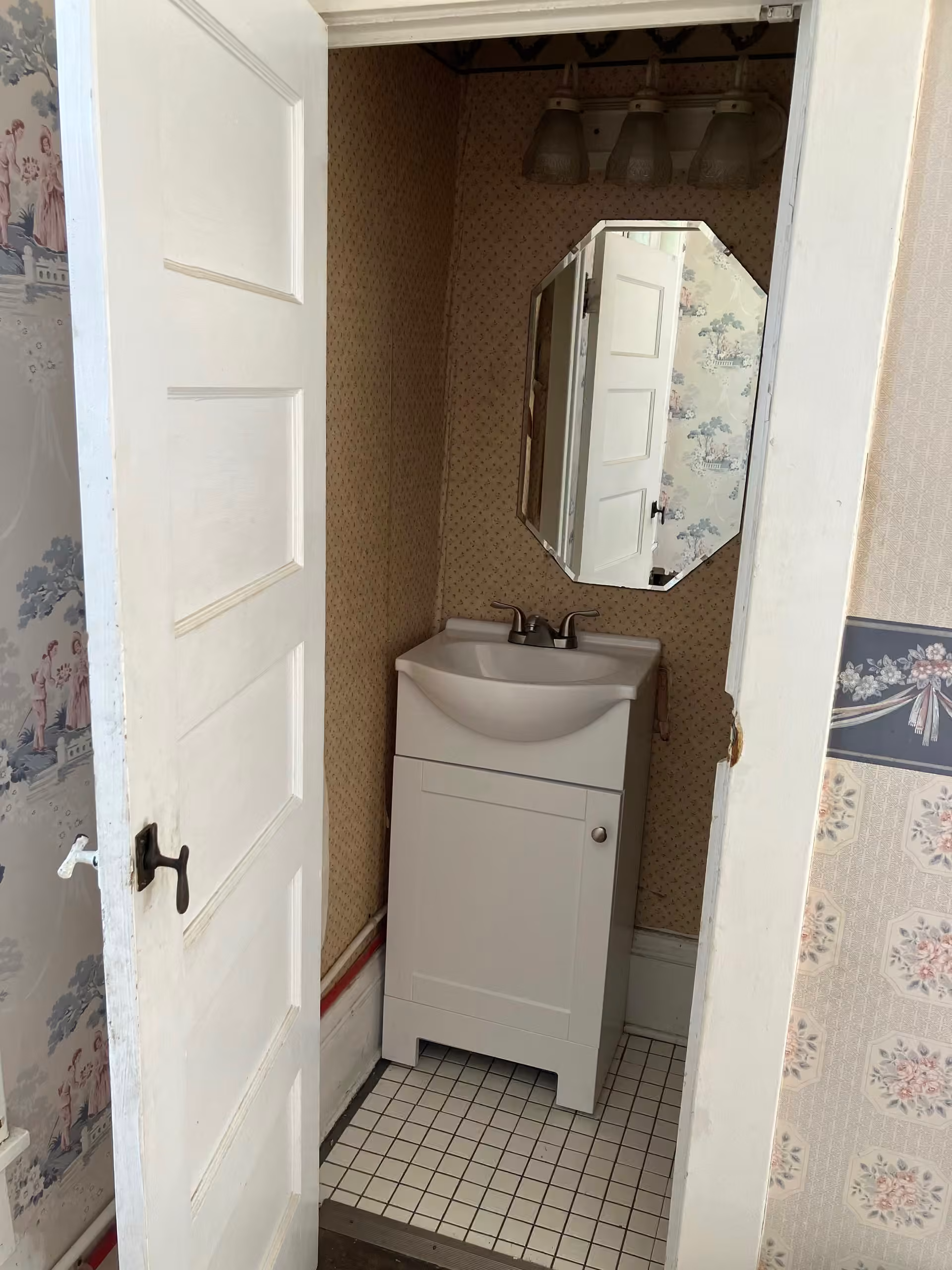 Virginia Cottage powder-room vanity and mirror