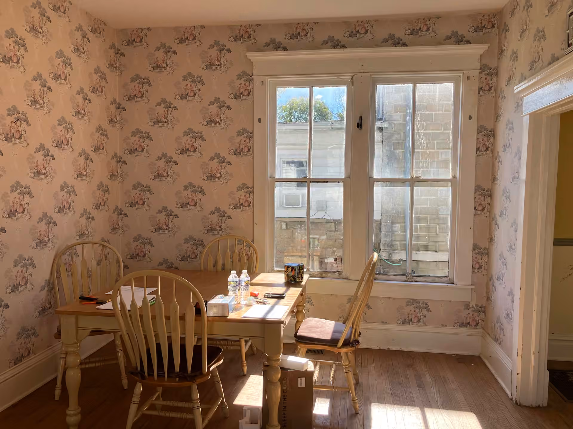 Virginia Cottage dining or work area with table and windows